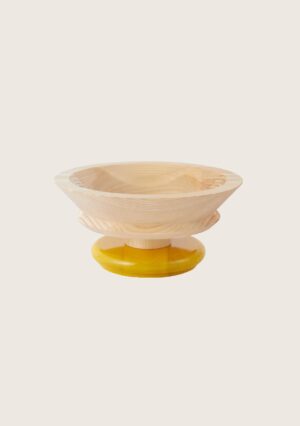 Tour de table en bois jaune de chez Alessi