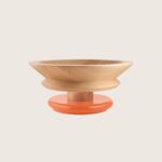 Tour de table en bois orange de chez Alessi
